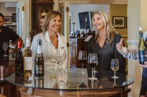 A group of people tasting wine at Mission Estate Cellar Door